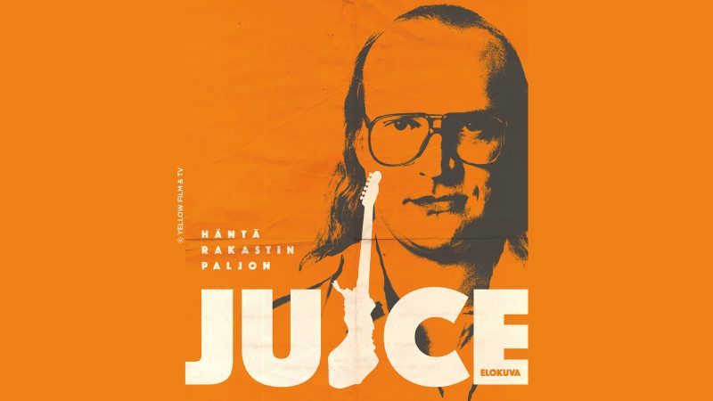 Juice Leskisen hahmo oranssin taustan keskellä