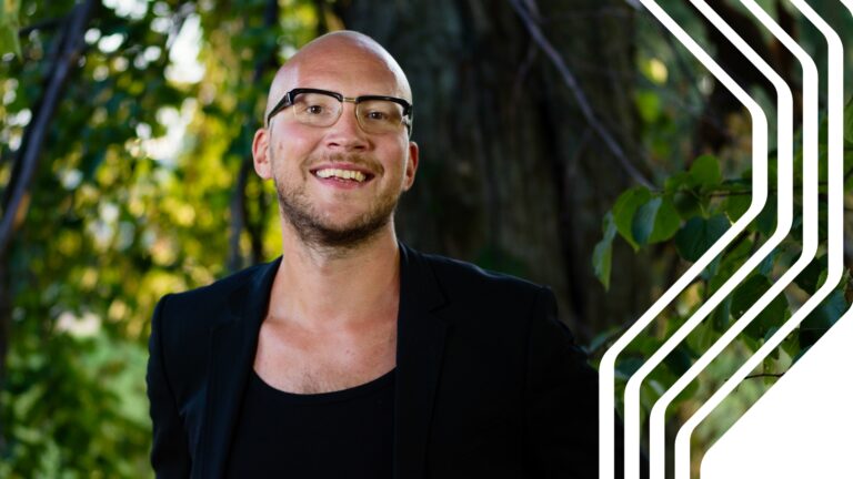 A man enjoying a green background