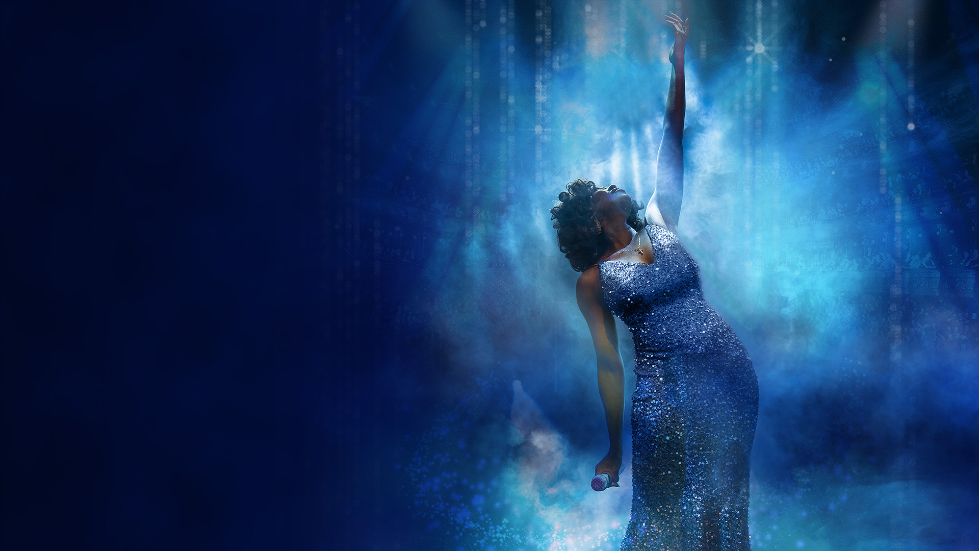 Laulaja sinisessä iltapuvussa.