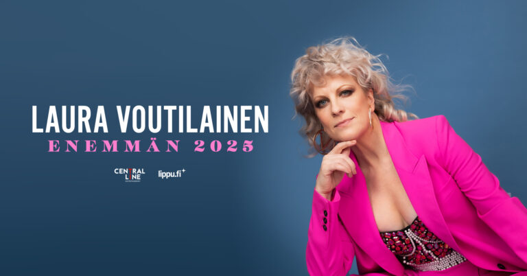 Artisti pinkissä puvussa nojaa käteen.