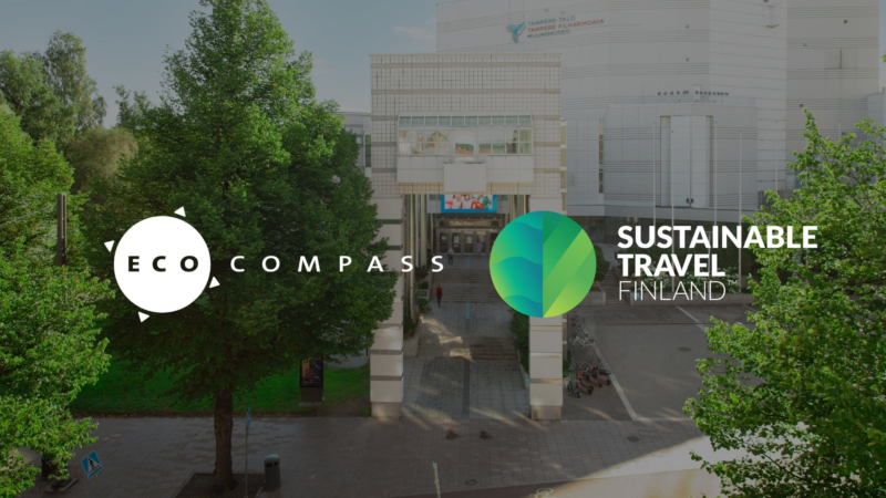 Sustainability at Talo Events: Front entrance of Tampere Hall, the picture includes the logos of EcoCompass and Sustainable Travel Finland