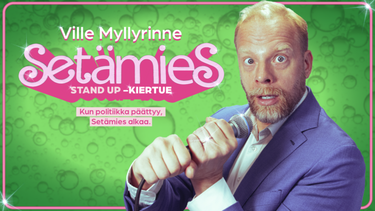 Artisti suu auki mikrofoni käsissään.